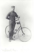 Charles Headley with a bicycle